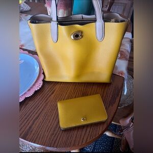 Like new yellow coach bag with wallet